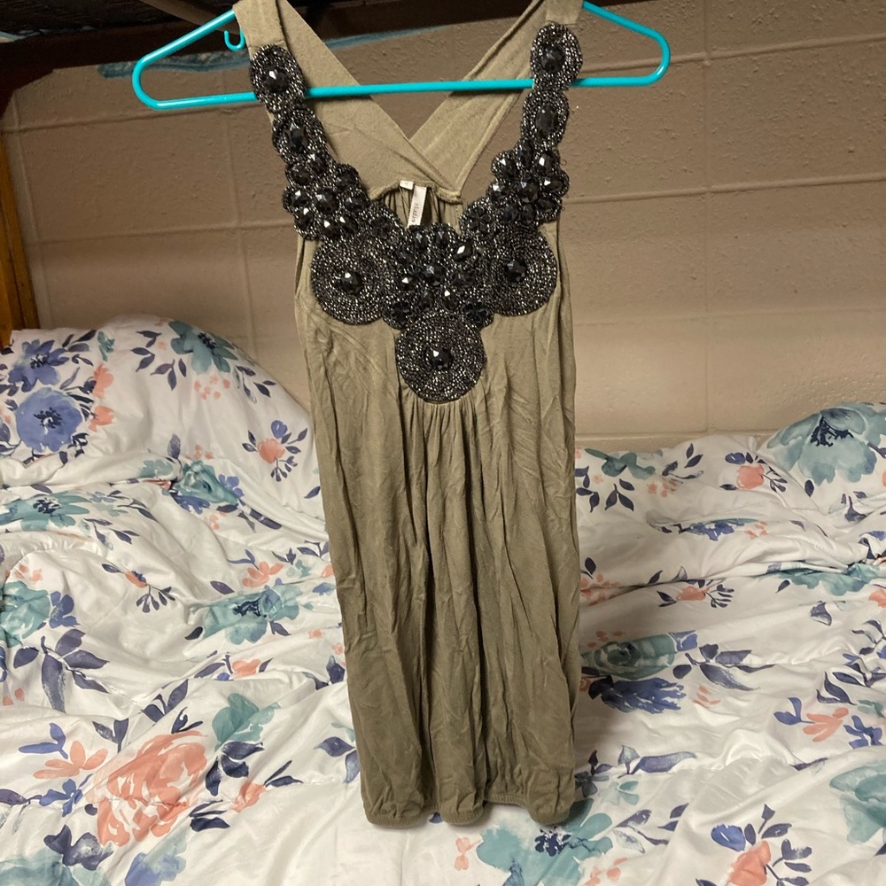 Green tank top with black green details